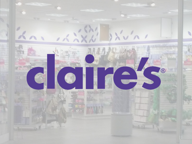 Claire's Accessories logo at Palouse Place overlaid on store interior view from entrance