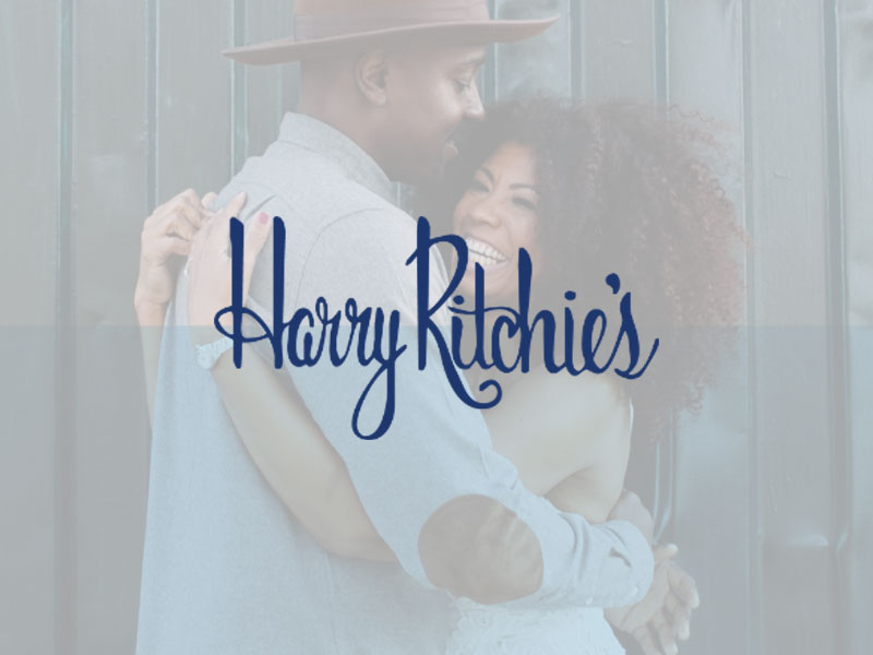 Harry Ritchie's logo at Palouse Place overlaid on image of a couple hugging wearing jewelry