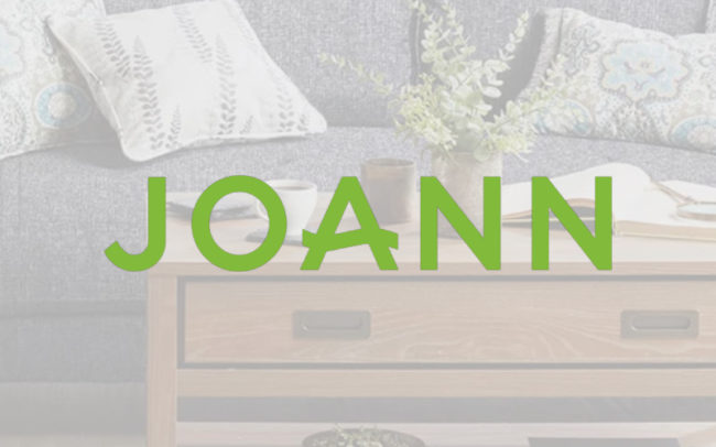 Joann Fabrics logo at Palouse Place overlaid on living room set arrangement