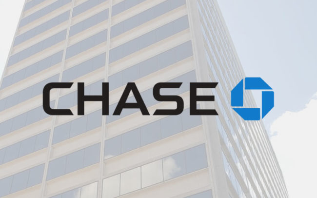 Chase Bank logo at Palouse Place overlaid on image of a high rise building with a little sky to the side