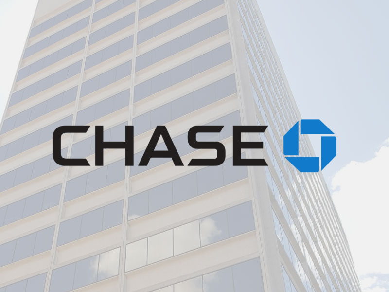 Chase Bank logo at Palouse Place overlaid on image of a high rise building with a little sky to the side